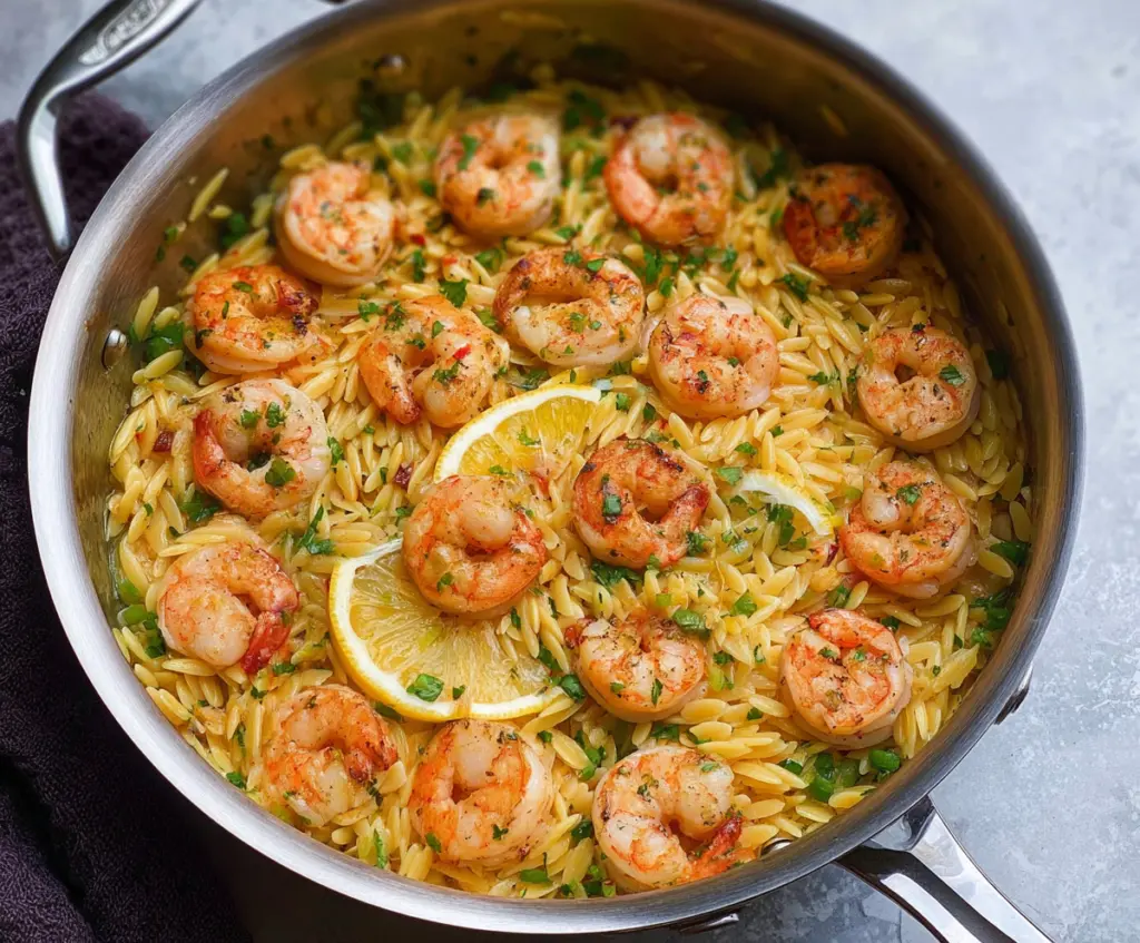 Delicious shrimp orzo pasta in a zesty lemon garlic sauce with fresh herbs.